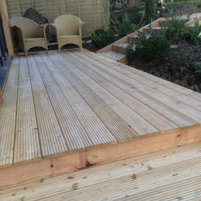 Natural larch deck area for garden room, Littlewood, Sussex